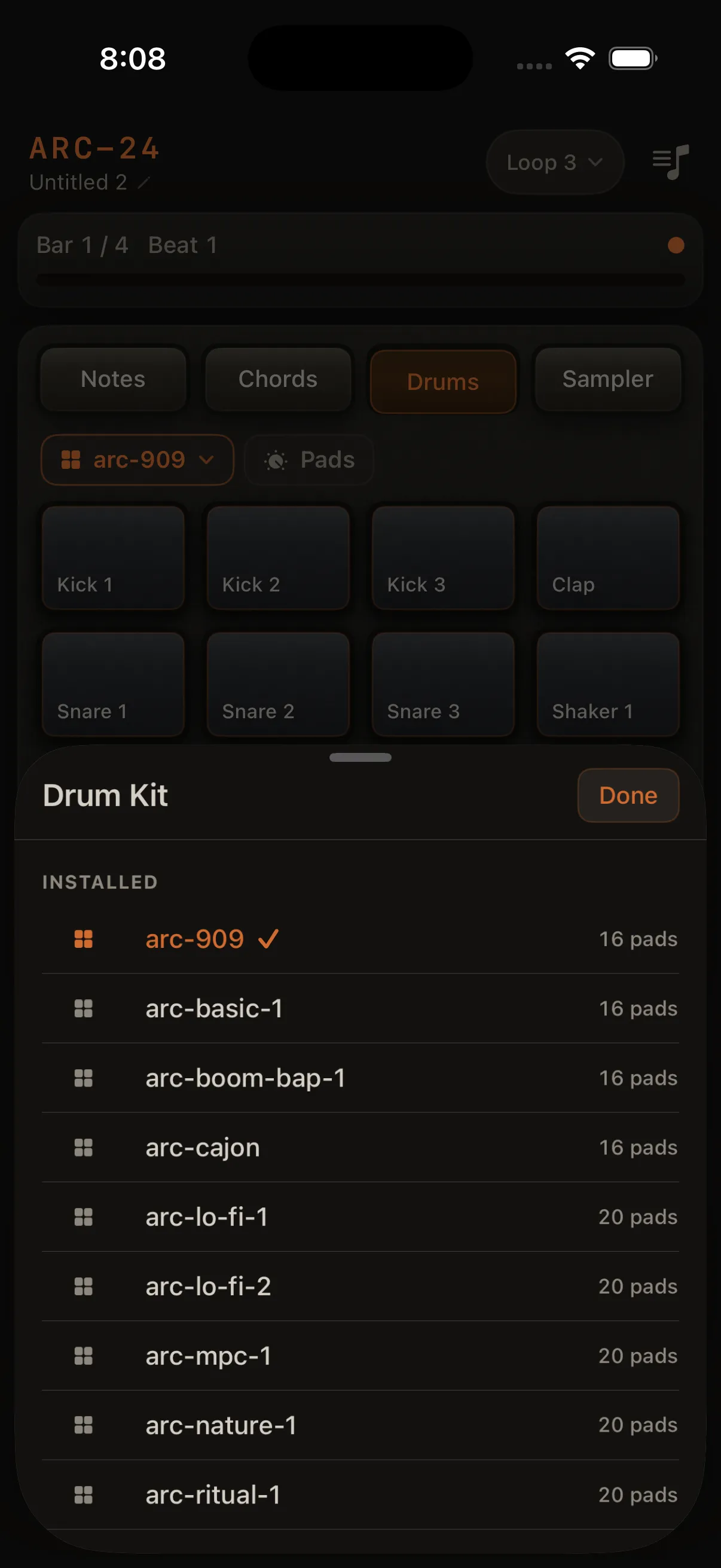 Kit picker sheet: scrollable installed kits, grid icon, checkmark beside active name, pad count on the right.